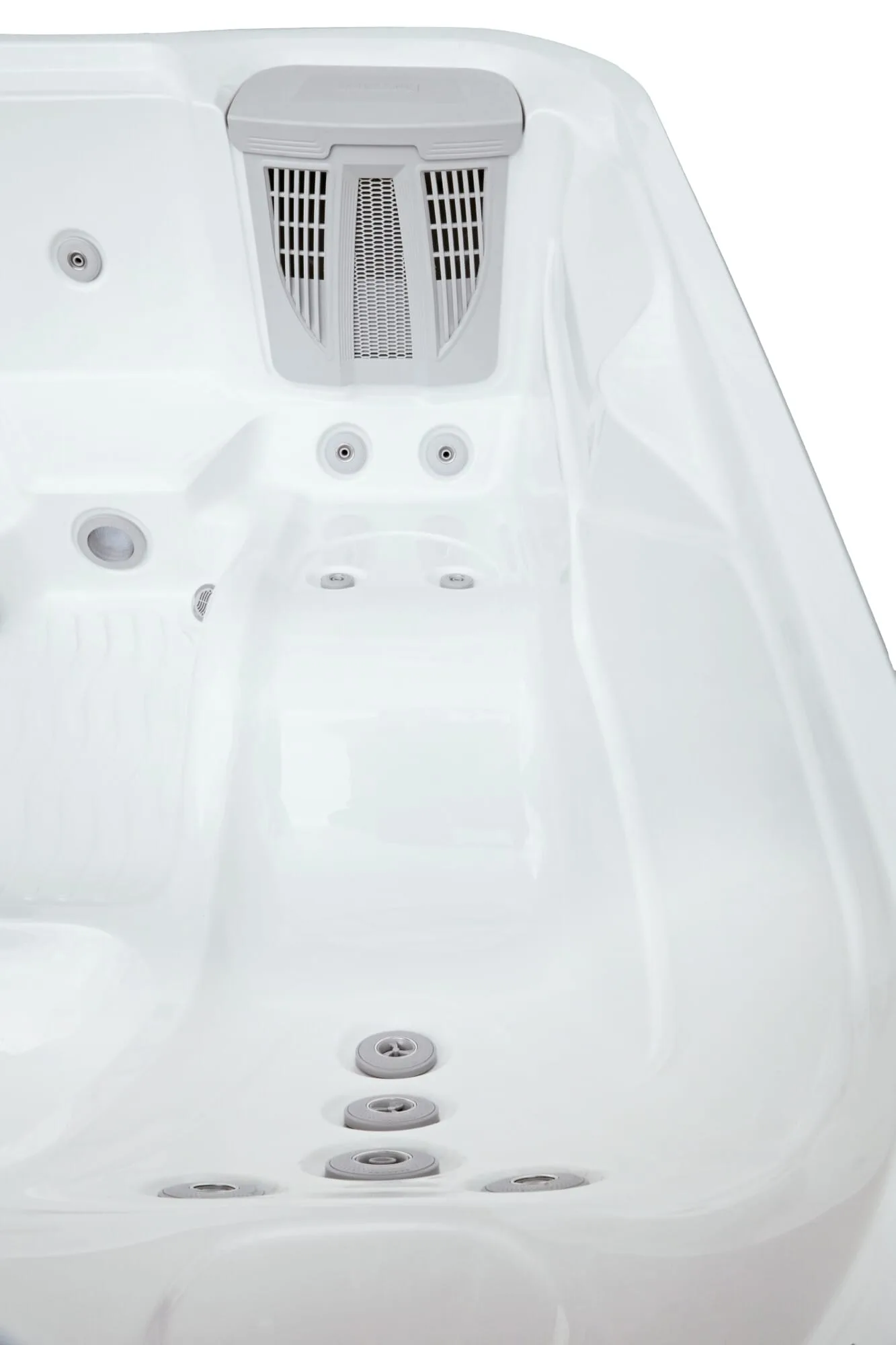 Close-up interior view of the Vacation Cypress hot tub, highlighting the white acrylic seating, hydrotherapy massage jets, and filtration system.