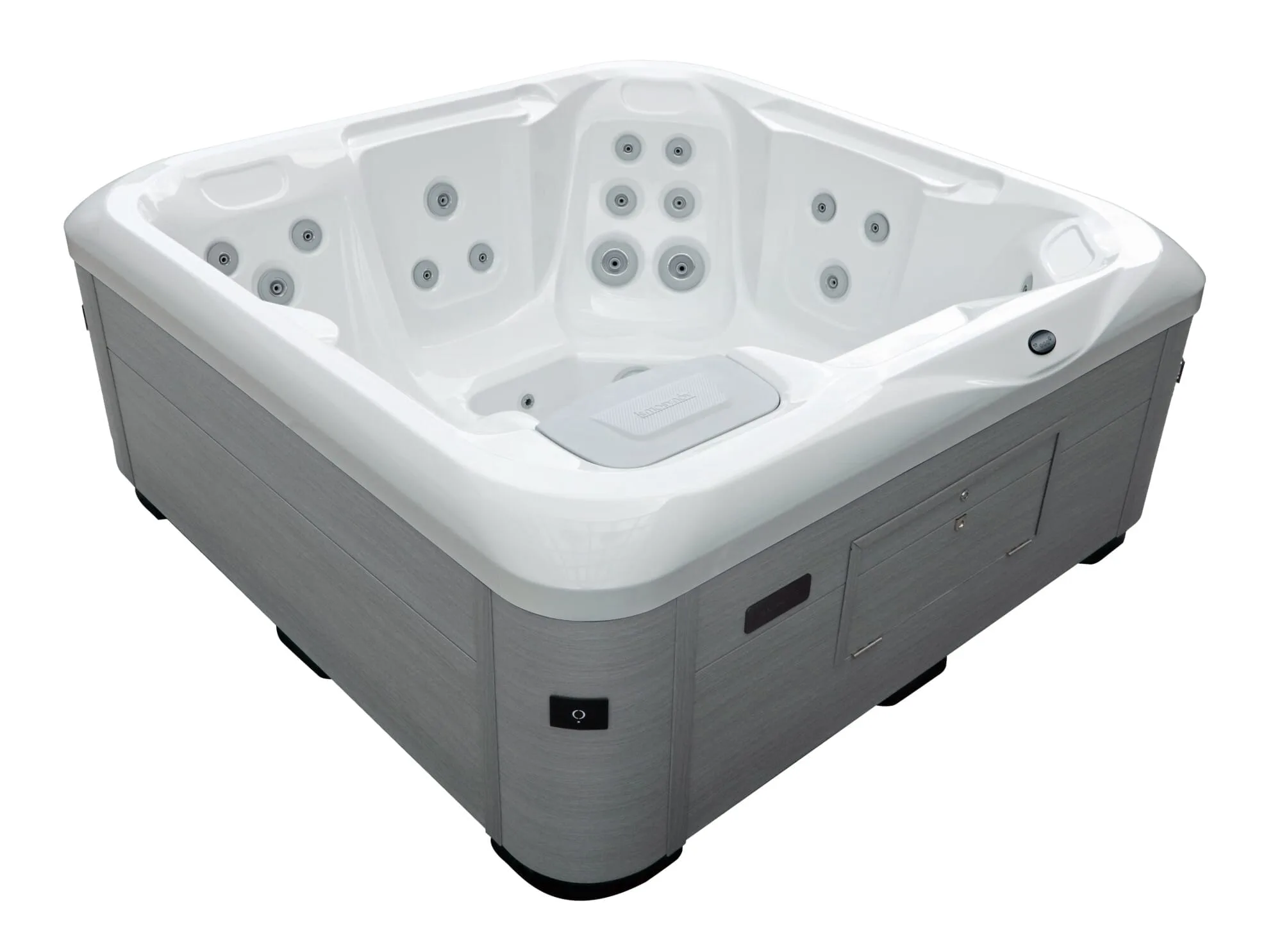 Angled high view of the Vacation Cypress hot tub showcasing the closed flush lockable panel, modern grey cabinet, and pristine white interior.