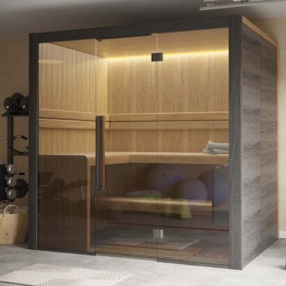 Hekla 210 large-capacity indoor traditional sauna with expansive panoramic glass facade and premium Nordic timber finish, Roberts Leisure Isle of Man.
