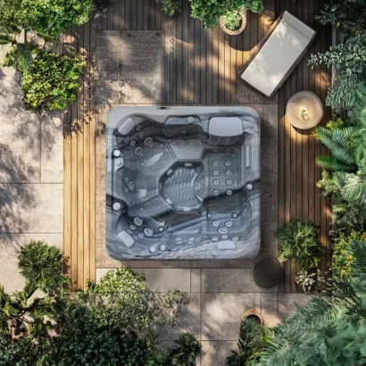 AquaSolus Eden (Series 2) luxury 5-seater hot tub featuring a full-body lounger, 42 precision hydrotherapy jets, and Gecko K1000 touchscreen controls, Roberts Leisure Isle of Man.