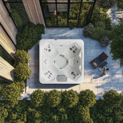 Vacation Cove premium holiday let hot tub by AquaSolus, featuring a social open-plan seating layout and commercial-grade filtration, Roberts Leisure Isle of Man.