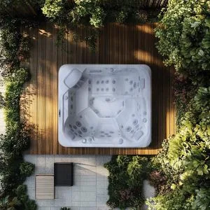 AquaSolus Aspen (Series 2) luxury 7-seater hot tub featuring an open-plan social layout, 44 precision hydrotherapy jets, and Gecko K1000 touchscreen controls, Roberts Leisure Isle of Man.