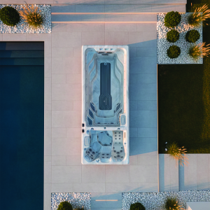 AquaSolus Fusion Professional Swim Spa featuring an adjustable high-performance swim current, dedicated hydrotherapy zone, and Gecko K1000 touchscreen controls, Roberts Leisure Isle of Man.