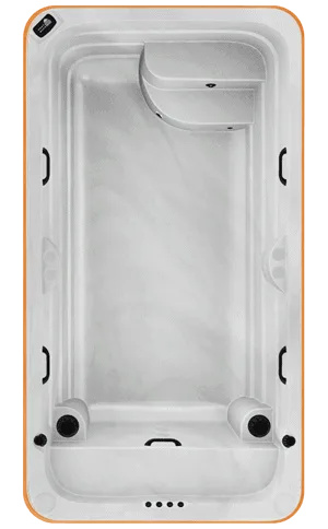 A top-down view showing the interior layout of the Arctic Spas Kingfisher all-weather swimming pool, highlighting the spacious swim area and hydrotherapy seating, available in the Isle of Man.
