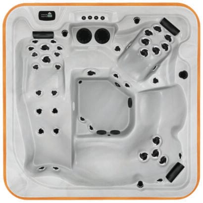 Overhead view of the Arctic Spas Mustang hot tub shell in white, showing a spacious 5-6 person capacity with multi-level seating and therapeutic jets, available on the Isle of Man.