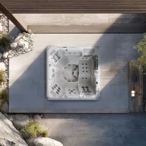 AquaSolus Serenity (Series 3) premium 6-seater hot tub featuring a full-body lounger, 46 precision hydrotherapy jets, and Gecko K1000 touchscreen controls, Roberts Leisure Isle of Man.