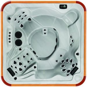 Overhead view of the Arctic Spas Totem hot tub shell in white, featuring a 4-5 person seating layout with varied hydrotherapy jets, available for Isle of Man delivery.
