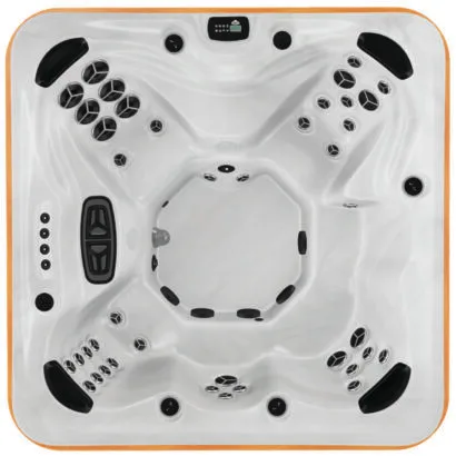 Overhead view of the Arctic Spas Yukon hot tub in white, showing an open 6-person seating configuration with a large central footwell, available for delivery across the Isle of Man.