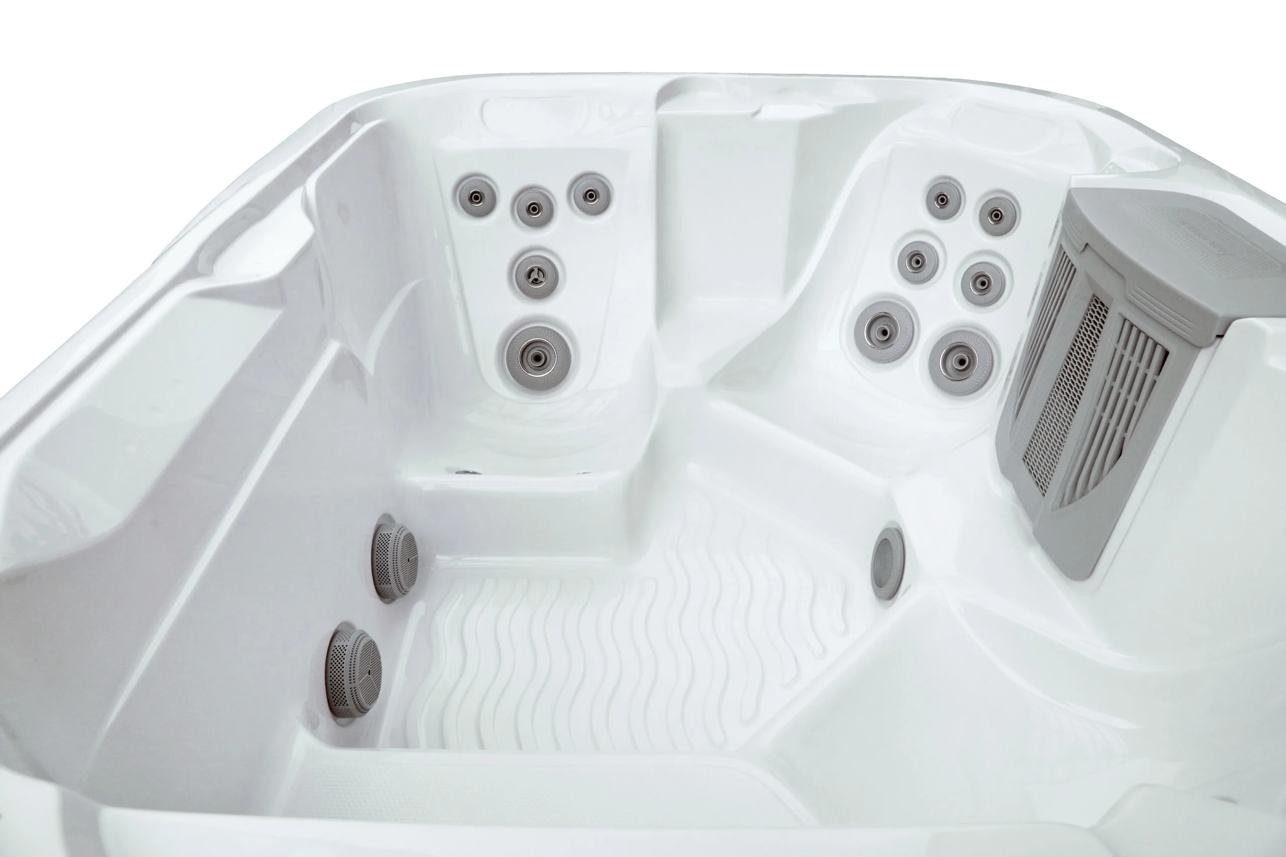 Close-up view of the Vacation Brook hot tub interior, focusing on the hydrotherapy massage jets and integrated filtration housing.