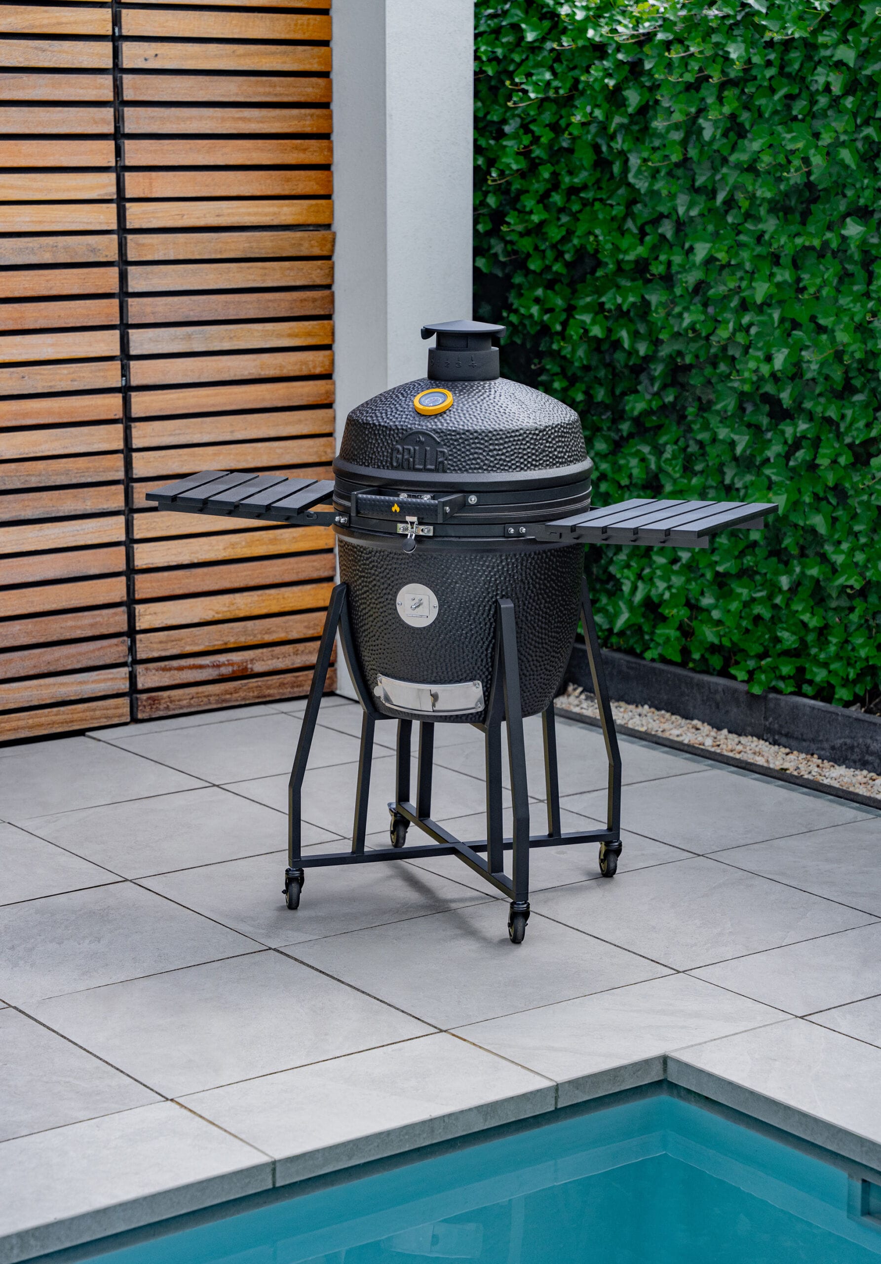 Grllr Kamado ceramic grill featuring precision temperature control, versatile cooking surfaces, and durable weather-resistant construction, Roberts Leisure Isle of Man.