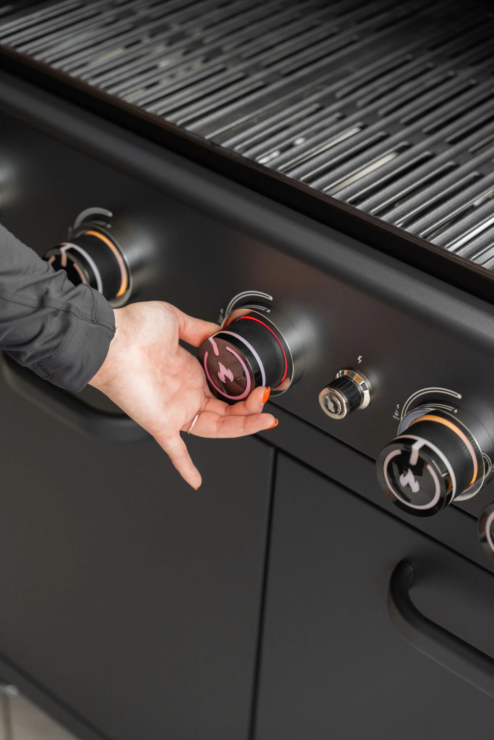 Grllr outdoor kitchen control dials featuring intuitive, illuminated heat management, robust tactile feedback, and weather-resistant design, Roberts Leisure Isle of Man.