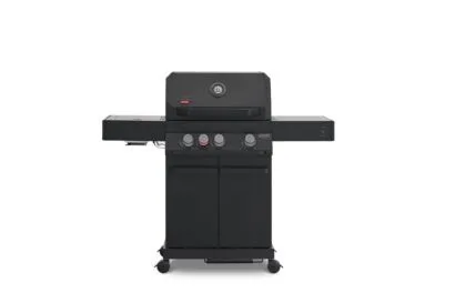 A direct front view of a matte black Primeliner G3 gas barbecue grill featuring a closed lid with an integrated temperature gauge, four control knobs, dual side shelves, and a two-door storage cabinet on wheels.