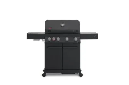 A direct front view of a matte black Primeliner G4 gas barbecue grill featuring a closed lid with an integrated temperature gauge, five control knobs, dual side shelves, and a two-door storage cabinet on wheels.