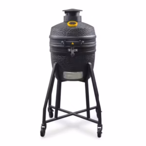 A direct front studio view of a compact matte black GRLLR Ember Classic 16-inch ceramic kamado grill mounted on a tall four-wheeled steel trolley.