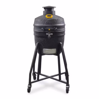 A direct front studio view of a compact matte black GRLLR Ember Classic 16-inch ceramic kamado grill mounted on a tall four-wheeled steel trolley.