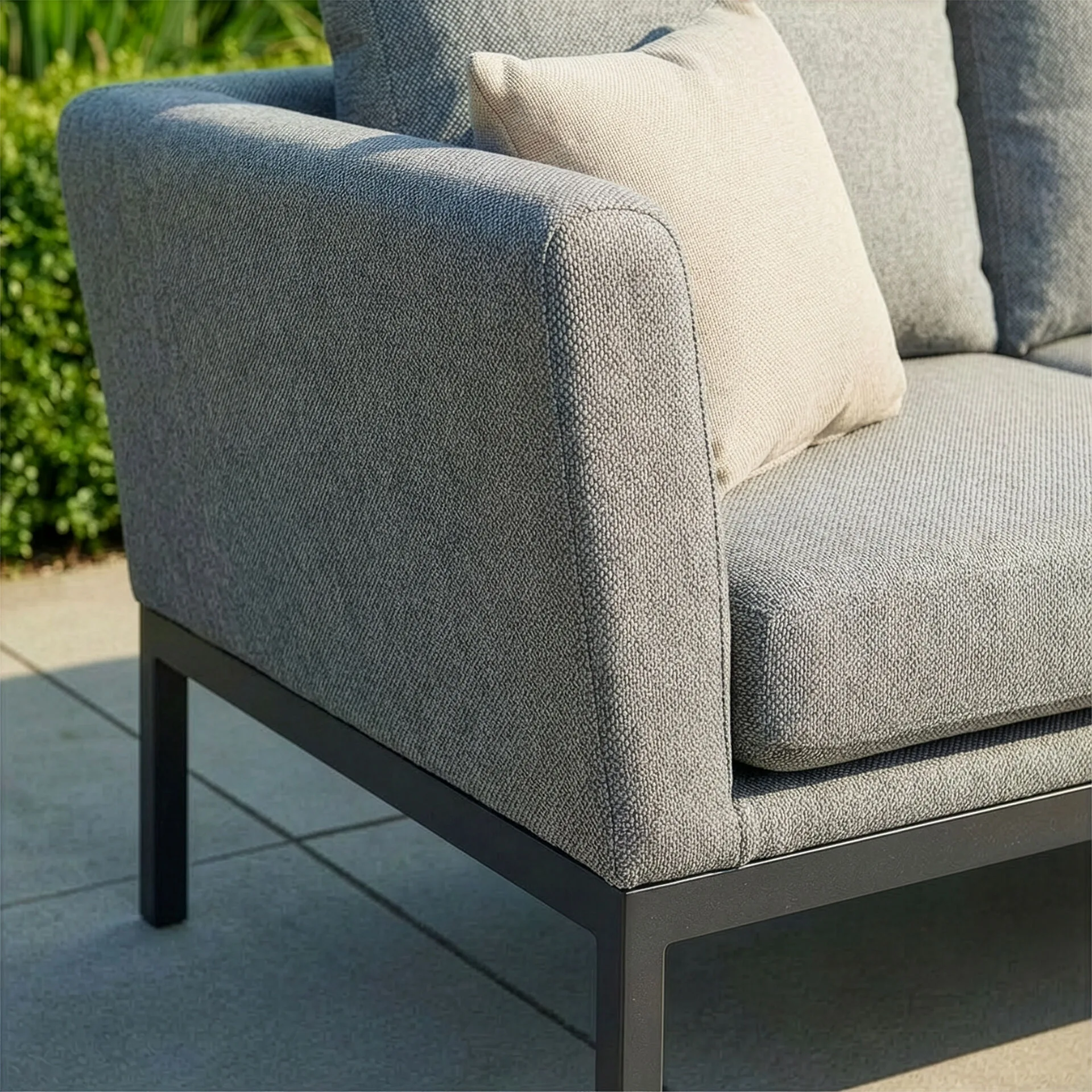 Detail shot of the high-performance Zinc Grey fabric and modern grey frame of the Maze - Outdoor Fabric Pulse U Shape Corner Dining Set with Rising Table - Zinc Grey from Roberts Leisure, Isle of Man.
