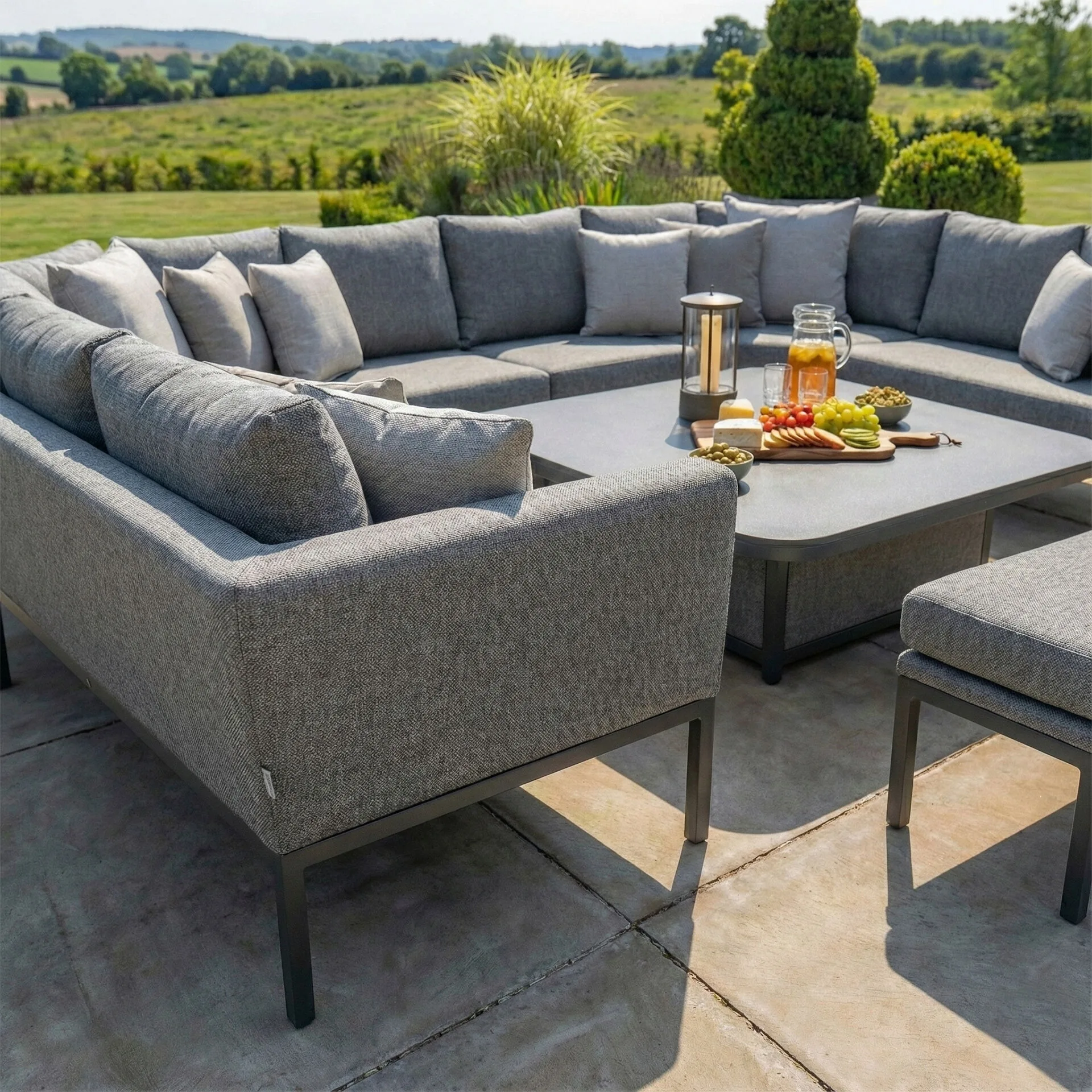 Close angle of the spacious seating on the Maze - Outdoor Fabric Pulse U Shape Corner Dining Set with Rising Table - Zinc Grey at Roberts Leisure, Isle of Man.