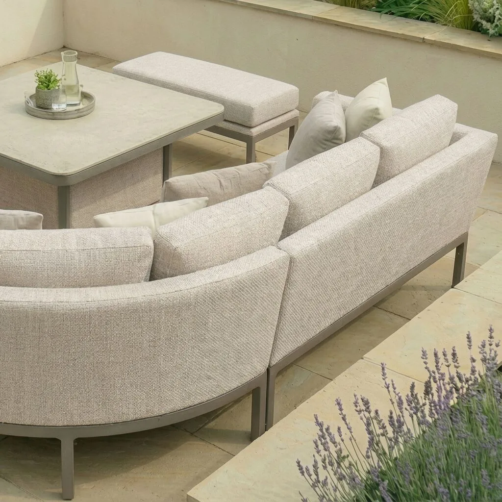 Rear view showing the elegant curved back and cafe frame of the Maze - Outdoor Fabric Pulse U Shape Corner Dining Set with Rising Table - Latte with cafe frame at Roberts Leisure, Isle of Man.