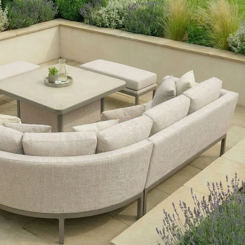 Rear view showcasing the curved style and cafe frame of the Maze - Outdoor Fabric Pulse Deluxe Square Corner Dining Set with Rising Table - Latte with cafe frame at Roberts Leisure, Isle of Man.