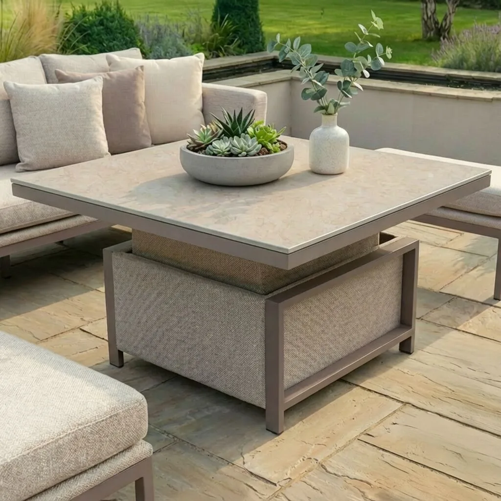 Close-up of the versatile square rising table included with the Maze - Outdoor Fabric Pulse Square Corner Dining Set with Rising Table - Latte, highlighting the elegant tabletop and fabric-wrapped base at Roberts Leisure, Isle of Man.